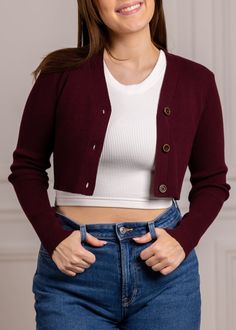 Upgrade your game day looks as the season gets colder with this gorgeous maroon cropped cardigan! This cardigan features a cropped design with three buttons up the middle so you are able to wear it closed, or open! Check out our bottoms section to find the perfect skirt to complete your next game day! Crop Cardigan Outfit, Game Day Looks, Cardigan Outfits, Maroon Color, Knit Crop, Cropped Cardigan, Winter Fashion Outfits, Game Day, Winter Fashion