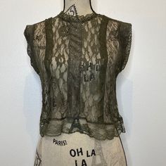 Romeo & Juliet Couture Olive Green All Lace Crop Top Sleeveless Size: Medium Condition: New With Tag Fabric Content: 100% Polyester Measurements Are Taken Laid Flat: B: 18” L: 18” Bundle For A Better Discount. Comes From A Smoke Free Home. If You Want More Information, Please Don’t Hesitate To Ask Any Questions Needed! Sleeveless Sheer Lace Tops, Chic Sleeveless Sheer Top, Fitted Lace Trim Tank Top, Sheer Fitted Sleeveless Tank Top, Fitted Sheer Sleeveless Blouse, Fitted Sleeveless Lace Tank Top, Sleeveless Lace Top With Lace Trim For Layering, Fitted Lace Top For Summer Layering, Sleeveless Sheer Top For Daywear