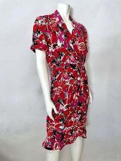 "Vintage Women's 80's St. Gillian, Red, Pink Floral, Short Sleeve, Silk Wrap Dress (S) This Ladies 1980's Dress comes in silk with a floral print in red, pink, brown and black with short, cuffed sleeves, with a wrap like front with a v neckline, a layered wrap skirt, front pleats and sits at the knee with a bottom loose ruffle trim. The fabric is soft, light weight and does not stretch. 100% Silk Made in Korea *This dress is in excellent condition. Size: (S) Modern Day Size 4 Bust: 34\" Waist: 2 Fitted Red Rayon Dress, Red Floral Print Rayon Dresses, Red V-neck Floral Summer Dress, V-neck Floral Print Wrap Dress For Daywear, Pink Floral Print V-neck Wrap Dress, Red Floral Print V-neck Dress, 80s Floral Dress, Silk Wrap Dress, Geometric Top