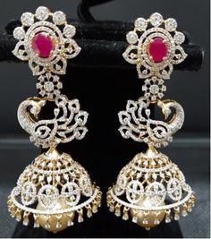 18 Karat Gold '4 in 1' Detachable Diamond Jhumkas - Diamond Dangle Earrings with Color Stones & Pearls
  This product has Inter Changeable Red & Green color Stones in the Earrings 
    Note: Only front side has Diamonds as shown in the picture, the back part of the Jhumka which is not visible from the front is only Gold without Diamonds - 1-BG-DER-TP10547 - in 41.940 Grams for USD $6008.37. 
Made in India by Totaram Jewelers Online this product is in Gold - 18 Karat Gold  & is an exc Diamond Danglers For Reception, Traditional Diamond Earrings With Accents For Formal Occasions, Traditional Formal Diamond Earrings With Accents, Traditional Diamond Earrings With Diamond Accents, Traditional Diamond Bridal Earrings For Reception, Traditional Bridal Earrings With Diamond Accents For Formal Occasions, Diamond Jhumkas With Latkans For Festivals, Diamond Chandbali Jhumkas With Latkans, Diamond Chandbali Bridal Earrings For Diwali