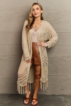 HEYSON Boho Chic Full Size Western Knit Fringe Cardigan
This cardigan features a luxuriously soft knit that feels gentle against your skin, ensuring ultimate comfort all day long. The trendy fringes add a touch of bohemian flair, making it a versatile piece that can effortlessly elevate any outfit. Whether you're heading to the office or a casual weekend outing, this cardigan is a must-have for staying warm, chic, and effortlessly fashionable. Long Summer Cardigan, Trendy Fringe, Georgia Fashion, Chic Cardigan, Fringe Cardigan, Casual Weekend, Western Fashion, Fashion Boutique, Knit Cardigan