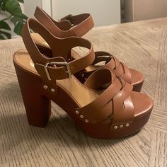 Brand New Never Worn Gianni Bini Sandals. Brown Leather With Gold Details. Size 9.5 Beach Sandals With 4-inch Block Heel, Beach Sandals With 4-inch Heel And Round Toe, High Heel Sandals With Buckle Closure For Vacation, Leather Platform Heels For Vacation, Brown Sandals With 4-inch Heel For Beach, Brown 4-inch Heel Sandals For Beach, Vacation Closed Toe Heels With Wooden Heel, Vacation Heels With Wooden Heel And Closed Toe, Closed Toe Heels With Wooden Heel For Vacation