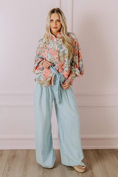 - Go with this flow in these trendy pants! - Unlined chambray material - A waistline with an elastic back, belt loops, and a removable tie closure belt - Pleated details on front - Functional side pockets - A relaxed silhouette that ends in wide floor length hemlines Casual Light Wash Pants For Spring, Spring Relaxed Fit Medium Wash Pants, Casual Wide-leg Pants With Belted Cuffs, Casual Belted Bottoms In Denim Blue, Casual Denim Blue Belted Bottoms, Light Blue Denim Pants For Spring, Trendy Paperbag Waist Pants For Spring, Trendy Spring Pants With Paperbag Waist, Trendy Spring Paperbag Waist Pants