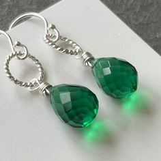 Fantastic plump dewdrop emerald green Quartz. The ultimate in color and sparkle. This stones is 12mm high, so it's not tiny. Sterling silver Hoop. Please choose your earwire ( options available exclusively at shirzay.com ) or the default French ball hook in sterling silver shown will be sent. APPRX. Length is 1 5/16”. Your jewelry will be beautifully giftboxed. Green Sterling Silver Small Hoop Jewelry, Green Small Hoop Sterling Silver Jewelry, Green Sterling Silver Small Hoop Earrings, Sterling Silver Hoop Earrings For May Birthstone, Green Teardrop Nickel-free Hoop Earrings, Green Teardrop Nickel Free Hoop Earrings, Nickel-free Green Teardrop Hoop Earrings, Green Gemstone Small Hoop Jewelry, Green Gemstone Dangle Hoop Earrings