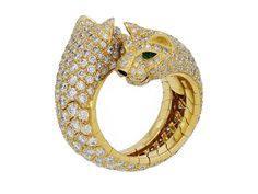 Of bypass design, with panther head terminals, with emerald eyes and onyx nose, pavé-set with diamonds in 18k yellow gold. Signed Cartier. Cartier Diamond Rings, Wide Diamond Bands, Cartier Panther, Panther Ring, Black Gold Jewelry, Cartier Panthere, Gold For Sale, Diamond Fashion Rings, Jewellery Marketing