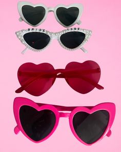 **Fun & Fabulous Hen Party Sunglasses | Perfect for Your Bridal Bash Make your hen party unforgettable with our stylish and playful variety of hen party sunglasses! Whether you're hitting the beach, heading to a club, or just enjoying a fun day out, these sunglasses are the perfect accessory to add a touch of glamour and fun to your celebration. Playful Sunglasses For Valentine's Day Party, Playful Party Sunglasses For Valentine's Day, Playful Sunglasses For Party, Playful Valentine's Day Party Sunglasses, Heart-shaped Sunglasses For Summer Weddings, Heart-shaped Wedding Sunglasses For Summer, Trendy Pink Party Sunglasses, Glamorous Pink Party Sunglasses, Glamorous Pink Sunglasses For Party