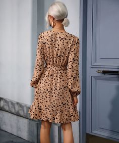 Our Labyrinth Dress comes in a stunning beige base featuring a leopard-inspired print. This relaxed mini features a V neckline with a tie detailing. The cinched puff long sleeves, elasticated waistband, and layered skirt with frill detailing are lovely additions to this mini. Size Guide: Melina is 5’6” tall, and has a 33.5” bust, 24.8”waist, & 37.4” hips. She is wearing a S / US 4 / AU 8. This dress is true to size. Material: 100% polyester Feature: Mini length. Relaxed fit. V neckline. Adjustab Beige Ruched Mini Dress For Fall, Chic Long Sleeve Leopard Print Mini Dress, Long Sleeve Leopard Print Mini Dress For Fall, Leopard Print Long Sleeve Mini Dress For Fall, Elegant Long Sleeve Leopard Print Mini Dress, Labyrinth Dress, Terrazzo Print, Long Sleeve Backless Dress, Casual Beach Dress