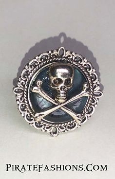 Lady Pirates love rings, the more the merrier. This be affordable, adjustable rings that match the Corset Dress Pins, Pirate Queen Necklace, Earrings n' Belts . They come in three colors (blue, red n' black) and two finishes (gold n silver). Gothic Metal Skull Ring Gift, Gothic Skull Ring Metal Gift, Adjustable Gothic Skull Jewelry, Adjustable Gothic Skull Ring As A Gift, Adjustable Vintage Skull Ring Gift, Vintage Adjustable Skull Ring For Halloween, Adjustable Vintage Skull Ring For Halloween, Vintage Nickel-free Skull Ring Gift, Vintage Nickel-free Skull Ring For Gift