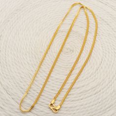 Please click -- Learn more about this item -- below for a full description 22k gold chain necklace handmade jewelry made in India Total length of the product is 22.5 inches and 2 millimeter width approx. weight is 9.74 grams approx. 22k Gold Link Chain Necklaces, 22k Gold Necklaces For Puja, Gold Necklace With 22k Gold Box Chain, Gold 22k Box Chain Necklace, 22k Gold Box Chain Necklace, 22k Gold Link Chain Necklace As A Gift, 22k Gold Necklace With Box Chain, 22k Gold Jewelry With Figaro Chain, 22k Yellow Gold Jewelry With Figaro Chain