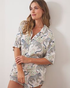 The sweetest dreams start in this satin sleepwear set.  Good to know 100% eco-friendly viscose that's thermoregulating, breathable and cool.  Sourced from forests following the principles of Sustainable Forestry Management. Soft & lightweight fabric drapes beautifully. Lovingly designed in Philadelphia then hand screen-printed by artisans in India. Please note this style does not include pockets.  Tender, love & care: Launder on a cold, hand wash or delicate cycle with like colors. Do not bleach. Hang to dry and press lightly on a low temperature for a fancy look. Shop all Satin loungewear. Fit & sizing: 2 1/4" inseam. Pull-on style shorts with slightly curved edges. Incredibly relaxed fit top is slightly cropped and features a drop shoulder.  For sizing guidance, take a look at our Size C Sweetest Dreams, Satin Sleepwear, Cozy Evening, Concert T Shirt, Good To Know, Pj Pants, Satin Pajamas, Sleepwear Sets, Sleep Shirt