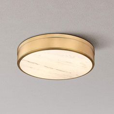 a round light fixture on the ceiling