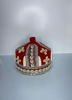 Discover the elegance and cultural significance of the African Crown Hat, a stylish and traditional piece perfect for any occasion. This Nigerian Igbo Traditional Red Odogwu Igwe Hat embodies the rich heritage of the Igbo people, making it an excellent gift for your husband or boyfriend. Crafted with meticulous attention to detail, this red igwe hat is not just a fashion statement but a symbol of honor and respect in Igbo culture. The Odogwu hat is designed for comfort and style, ensuring that i Elegant Red Ceremonial Headpieces, Traditional High Crown Headpiece For Party, Traditional Costume Hat With Structured Crown, Traditional White Ceremonial Hat, Traditional High Crown Ceremonial Hats, Traditional Wedding Hat With Structured Crown, Traditional Red Hat, Traditional Red Party Hat, Traditional Red Hat With Round Crown