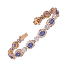 5.38 Carat Sapphire and Diamond Bracelet in 18K Gold This magnificent Oval shape sapphire tennis bracelet is incredulous. The solitaire Oval-shaped Oval-cut sapphires are beautifully With Single Diamonds making the bracelet more graceful and adding depth. Details of the piece: Diamond: 3.91 carats Sapphire: 5.38 carats Note: The width and size of the bracelet can be changed. This piece can be made in any color of gold. Sapphire Tennis Bracelet, Modern Bracelets, All Gems, Sapphire Bracelet, Tennis Bracelet Diamond, Sapphire Stone, Diamond Bracelets, Dream Jewelry, Sapphire Diamond