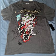 Brand New Vintage Ed Hardy Tshirt. Too Big, Never Worn. Size L Silver Casual T-shirt For Streetwear, Silver Casual T-shirt With Letter Print, Silver Casual Top For Streetwear, Casual Silver T-shirt With Letter Print, Casual Silver Top For Streetwear, Silver Cotton Tops For Streetwear, Silver Cotton Top For Streetwear, Silver Crew Neck T-shirt With Letter Print, Casual Silver Tops With Graphic Print