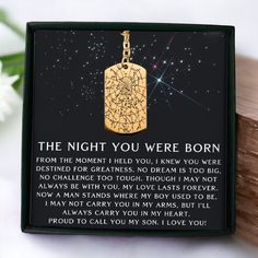 the night you were born necklace with poem on it and flowers in the back ground