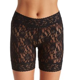 This feminine lace biker short is perfect for wearing under a stylish outfit. Sewn-on scalloped stretch lace waistband. Sheer, luxurious lace body. Rear center seam for defined fit. Mid thigh styling. Sewn-on scalloped lace hem. Sewn-in cotton crotch gusset. Perfect for wearing under dresses and skirts. Made in the USA. Please note: Model is wearing thong for modesty. Hanky Panky Women's Signature Lace Bike Short in Black | Size Medium | HerRoom.com Fitted Black Bottoms With Delicate Lace, Black Fitted Bottoms With Delicate Lace, Fitted Black Bottoms With Lace Patchwork, Black Fitted Bottoms With Lace Patchwork, Fitted Lace Shorts With Lace Trim, Fitted Lace Trim Shorts, Fitted Black Lace Shorts, Black Fitted Lace Shorts, Fitted Lace Shorts