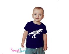 "\"Two-rex \" or \"Three-Rex\" dinosaur birthday tee. So cute and funny for your little one's second/third birthday, for regular wear or perfect as a gift. The first pic is the blue color \"Navy\", the second picture is the Blue color \"Caribbean\". Please note this is for the tshirt only, not for the undershirt as layered in the second photo. Please select your shirt color + design color+ TWO-rex or THREE-rex , in the drop down menu. See other photo's for more shirt colors and design colors. ➜➜ Dinosaur Print Short Sleeve T-shirt For Birthday, Birthday Dinosaur Print Short Sleeve T-shirt, Birthday T-shirt With Dinosaur Print, Dinosaur Print Short Sleeve T-shirt For First Birthday, First Birthday T-shirt With Dinosaur Print, Crew Neck T-shirt With Dinosaur Print For First Birthday, Three Rex Birthday Shirt, Three Rex Shirt, 2nd Birthday Tshirt