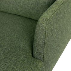 a close up view of the back end of a green couch