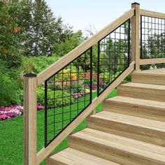 a set of wooden stairs with metal railings