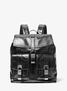 Crafted from rich crackled leather, our newest Darrington is a distinctive carryall for the seasoned traveler. The slouchy silhouette lends a vintage-inspired appeal, while the silver-tone buckles lend a polished and pragmatic finish. This handsome backpack opens to reveal a spacious interior sized to fit a laptop, while multiple exterior pockets offer easy access to your belongings. Make it your 24/7 essential for hands-free commutes. Travel Bag With Silver-tone Hardware And Coated Canvas, Travel Bag With Silver-tone Hardware, Leather Travel Backpack With Silver-tone Hardware, Leather Backpack With Silver-tone Hardware For Travel, Modern Travel Backpack With Silver-tone Hardware, Luxury Leather Backpack With Palladium Hardware For Travel, Luxury Leather Backpack With Silver-tone Hardware, Leather Backpack With Palladium Hardware For Everyday Use, Classic Travel Bags With Buckle Closure