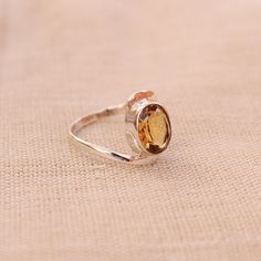 Gemstone - Citrine Gemstone Size - 10x08 oval Metal - Sterling Silver Citrine attracts wealth and helps you to overcome negative emotions, citrine also knows as the stone of success. To change the ring size i request the buyer to pull the band lock in the opposite direction. This Fabulous ring is made by granulation technique by soldering each ball precisely and wrapping the silver wire around the collet manually. The ring can be customized on request and gemstone can be switched to any gemstone Citrine Silver Ring, Oval Sterling Silver Crystal Ring For Anniversary, Anniversary Citrine Open Ring, Oval Citrine Crystal Promise Ring, Faceted Citrine Promise Ring Jewelry, Oval Faceted Rings For Anniversary, Unique Oval Birthstone Ring, Topaz Gemstone Rings Perfect As Gift, Topaz Gemstone Rings Perfect For Gifts