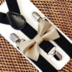 Your special guy will look so dashing when he shows up wearing this fine-looking champagne bow tie and black suspenders! Our champagne tie is a great choice for family photos, wedding, ring bearer outfit, birthday celebration or any other special occasion. ❤ **Please Specify**   Bow Tie Only (w/ Clip or Neck Strap), Suspenders Only, or Bow Tie Only & Susp (Bow Tie and Suspenders) SUSPENDERS- One Pair of our Quality Suspenders BOW TIE - One Bow Tie on White Adjustable STRAP or Alligator CLIP **CLIP ON Bow Ties are Recommended/Suitable for Children Only *Sizing: Please Check Measurements Before Ordering *Note: If your gentleman wears larger clothing for his age, we recommend going by the clothing size to be safe. Any other questions on this, please just ask!  Small: 6 months- 6 years Medium: Dapper Green Suit And Tie Accessories For Black Tie, Green Ties For Father's Day, Green Standard Tie For Party, Classic Green Suit And Tie Accessories With Satin Bow, Green Standard Tie For Parties, Classic Green Adjustable Suit And Tie Accessories, Green Bow Tie With Tie Back For Formal Occasions, Dapper Suspenders For Wedding, Green Bow With Tie Back