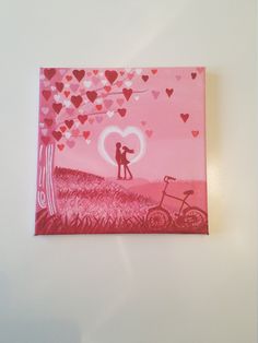 a couple kissing in front of a tree with hearts on the pink background and bicycle leaning up against it