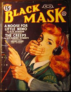 an old black mask book with a woman holding a phone and listening to headphones