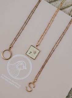 The four leaf clover, a symbol of the unique and extraordinary. The Kismet square necklace pairs this with the lucky number 7, so you can wear this personalised good luck charm close to your heart. Elegant Necklace With Rectangular Pendant And Box Chain, Elegant Gold Charm Necklace With Rectangular Pendant, Elegant Necklace With Box Chain And Rectangular Pendant, Elegant Pendant Chain Necklace In Recycled Gold, Timeless Pendant Chain Necklace As A Gift, Elegant Recycled Gold Pendant Chain Necklace, Timeless Pendant Chain Necklace For Gift, Elegant Gold Plated Rectangular Pendant Necklace, Fine Jewelry Everyday Rectangular Pendant