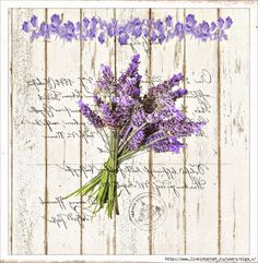 a bouquet of purple flowers sitting on top of a wooden table