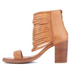 The Leila is a true showstopper. With its one-of-a-kind strappy braided design and stacked wooden heel this shoe will add personality to your summer looks. Leather Block Heels With Braided Straps, Leather Sandals With Wrapped Heel In Natural Color, Natural Leather Heels With Stacked Heel, Natural Color Sandals With Stacked High Heel, Natural High Heel Sandals With Stacked Heel, Natural Color High Heels With Stacked Heel, Natural High Heels With Stacked Heel, Natural Stacked High Heels, Gladiator Flats