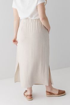 Step into a new season with confidence. The perfect blend of practical and pretty, the linen-blend ‘Winslet’ maxi skirt is a classic that you will reach for over and over again. We love the functional front pockets, adjustable waistband, and built-in lining. The modest side slits add a hint of interest to this full length skirt. There are endless styling opportunities from a simple top, to a chunky sweater, or a chic turtleneck. Exclusively designed with you in mind. 70% Rayon 30% Linen Hand Was Linen Maxi Skirt For Spring, Casual Beige Maxi Bottoms, Chic Linen Maxi Skirt With Pockets, Relaxed Fit Linen Maxi Skirt With Pockets, Beige Relaxed Linen Maxi Skirt, Flowy Linen Maxi Skirt With Pockets, Full Length Skirt, Full Length Skirts, Simple Top