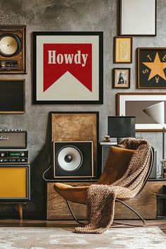 a living room filled with furniture and pictures on the wall next to a guitar amplifier