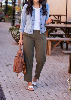 Spring Outfit with Neutral Pieces: white top + light jean jacket + olive pants Gap + white flat sandals + tan Nickel & Suede earrings + brown leather backpack close up White Top Jeans, Nursing Friendly Outfits, Light Jean Jacket, Suede Earrings, Summer Casual Outfit, Nickel And Suede, Top Jean, Olive Pants