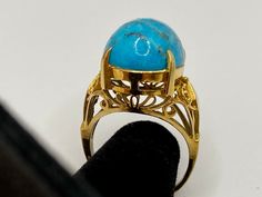 Welcome To Gold Knox Rare vintage 18K yellow gold women's ring with blue cabochon Turquoise. The stone measures 16 mm x 13 mm.Great piece with great details. Details below: Material 18k yellow gold, Turquoise Size 6 US Hallmark 18K This would make great addition to your jewelry collection. Thank you for looking PLEASE, BE SURE TO VIEW THE PICTURES CAREFULLY AND CLOSELY AS IT IS THE EXACT ITEM YOU ARE BUYING. Gold Knox Jewelry opened its storefront in Pasadena, CA in 2011, since then we do our BE Turquoise Jewelry Gold, Vintage Turquoise Jewelry, Light Blue Gemstone, Buying Gold, Blue Band, Vintage Turquoise, Ring Collections, Quality Diamonds, Gold Jewellery