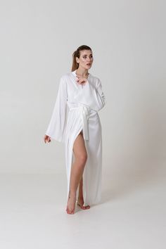 This chic silk robe is sewing from high quality fabric with flared sleeves. In this robe you can feel all your femininity. The robe will gently emphasize the roundness of your body. You can choose the size according to the standard size chart or order an individual size. Sleeve length - 58cm (22.8in) Robe length - 140cm (55 in) If you want less length - write about it in the order. The fabric is very pleasant to the body and looks great. In this robe you will look perfect in the morning of your Kimono Dressing Gown, Bridal Robe, Silk Robe, Pajama Robe, Bridal Robes, Womens Robes, Flared Sleeves, Getting Ready, In The Morning