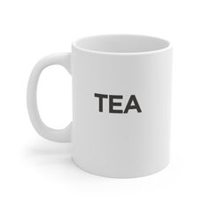 a white coffee mug with the word tea in black on it's front and side