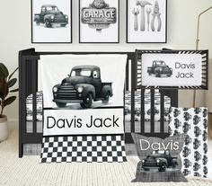 a black and white baby bedding set with cars