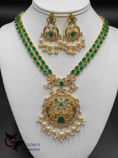 Double line emerald stones with CZ stones and pearls pendant with matching earrings Handmade jewelry Silver-plated jewelry One gram gold jewelry Official Website globusfashions.com 🌸 S H O P . M O R E . S T Y L E S 🌸 https://www.etsy.com/shop/Globusfashions Necklaces - https://www.etsy.com/shop/Globusfashions?section_id=18712263 Bracelets - https://www.etsy.com/shop/Globusfashions?section_id=18969767 Pendant Sets - https://www.etsy.com/shop/Globusfashions?section_id=18707402 Tikka - https://ww