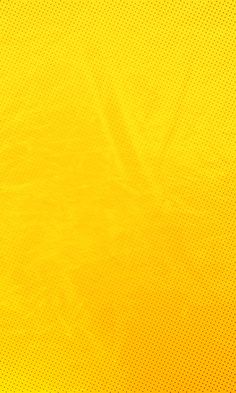 an abstract yellow background with dots