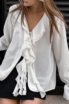 Details: Material: Polyester, Chiffon Style: Elegant Pattern Type: Solid Color Element: Ruffle Neckline: V Neck Sleeve Style: Flare Sleeve Sleeve Length: Long Sleeve Fit Type: Loose Clothing Length: Regular Type: Solid Color Size(in) Length Shoulder Width Bust Sleeve Length S 24.8 14.8 42.1 24.4 M 25.2 15.2 43.7 24.8 L 25.6 15.6 45.3 25.2 Tips:Due to the many variations in monitors, the color in the image could look slightly different, please take physical design and color shall prevail.Please a Chic Chiffon Tie Neck Tops, Spring Chiffon Blouse With Tie Neck, Spring Chiffon Tie Neck Blouse, Office Blouse With Ruffles And Tie Neck, Chic Ruffled Tie Neck Top, Feminine Chiffon Tops With Ruffles, Feminine Ruffled Chiffon Tops, Ruffled Tie Neck Blouse For Party, Ruffled Tie Neck Top For Party