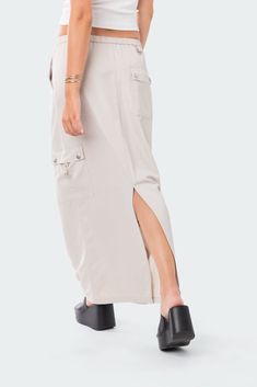 Cargo Skirt Drawstring waistband Cargo pockets Polyester, Rayon Model wears size S Model height is 5'6 Item care: Wash with similar color Skirt Cargo, Cargo Skirts, Thrift Inspo, Swimwear Dress, Cargo Skirt, Belly Chain, Drawstring Waistband, S Models, Model Height