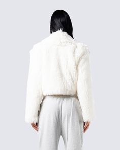 An ivory, shaggy faux fur coat with inside lining… do we need to say more? 👏🏽 Leave them in awe without saying a word - that's just the effect of being a lux baddie 😘 Shaggy Faux Fur Coat, Fuzzy Skirt, Denim Pleated Skirt, White Corset Dress, Parachute Pant, Chain Dress, Red Mini Skirt, Orange Satin, Flare Jumpsuit