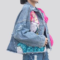 Take a step back in time and bring the past into the present with our Y2K-inspired Ribbon Jean Jacket for Women from our 2023 Spring-Summer Collection. With a stunning large fit and dazzling embellishments. this jacket is a unique piece of art that will turn heads wherever you go!Distinctive Features: Y2K Style: This jacket is an iconic reminder of the 90s. featuring a timeless denim fabric and a modern roomy fit. Embellished: This jacket is adorned with intricate ribbon detailing and unique tou Oversized Spring Denim Jacket With Patches, Trendy Patched Denim Jacket For Summer, Trendy Summer Denim Jacket With Patches, Trendy Embroidered Summer Outerwear, Embellished Cotton Denim Jacket, Spring Denim Embellished Outerwear, Casual Denim Outerwear With Sequins, Spring Embellished Denim Outerwear, Denim Sequined Outerwear For Fall