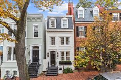 a row of townhouses in the fall