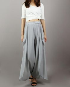 * Beautiful pearl chiffon pants, very comfortable to wear, not easy to get wrinkled, very easy to take care of.* Add an asymmetric layer on the front, very unique and beautiful.* Material: outer-pearl chiffon, lining-100% polyesterCustom made to fit, lead time is 6-8 days;Let us know your usual size in your country and your overall height.If you have some specific request or special characters such as broad shoulder, long arms, long waist, etc you think we need pay attention to when making, do l Versatile Summer Maxi Skirt With Elastic Waistband, Versatile Harem Pants For Spring, Versatile Non-stretch Harem Pants For Spring, Flowy Wide Leg Maxi Skirt For Spring, Solid High-waisted Harem Pants For Summer, High-waisted Harem Pants For Summer, Solid Color Summer High-waisted Harem Pants, Solid Color Baggy Long Skirt, Chic Solid Color Wide Leg Harem Pants