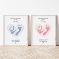 two framed prints with baby's footprints and the words happy father's day