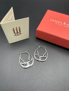 James Avery Rare Scrolled Earrings Sterling Silver 925 Retired and HTF  Comes with James Avery box Before purchasing, please make sure your shipping address is correct in your Etsy account. I will not change the shipping address after purchase due to so much buyer fraud going around. If you purchase and need an address change, we will have to cancel the transaction and start over.  Return Policy- Buyer must contact me within 5 days of delivery to notify me of return and ship with tracking insured within 7 days of receiving the item. No returns after the allotted days. Buyer pays return shipping and must return item with tracking number. Once item is returned back to me in its original condition, a refund will be issued. No returns allowed on customized pieces or rings that sized per custom Classic Engraved Sterling Silver Earrings, Engraved Sterling Silver Hoop Earrings For Anniversary, Sterling Silver Engraved Hoop Earrings For Anniversary, Hallmarked Oval Sterling Silver Hoop Earrings, Hallmarked Teardrop Hoop Earrings As Gift, Teardrop Hallmarked Hoop Earrings As Gift, Engraved Sterling Silver Hoop Earrings, Luxury Sterling Silver Hoop Earrings As Gift, Oval Sterling Silver Hallmarked Hoop Earrings