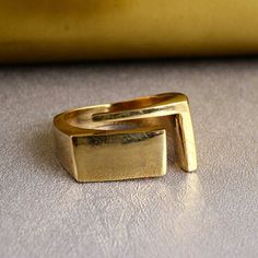 "Square Ring, Open Simple Ring, Gold Square Ring, Modern Ring, Unisex Jewelry, Geometric Ring, Minimalist Jewelry, Adjustable ❥ Customers satisfaction is our biggest priority, please contact us with any questions/queries for future or existing orders, and we will do our best to make sure you are happy with your order. ❥Please make sure to add the correct address during check out. You can return your purchased item within 15 days after successful delivery. We offer a 100% \"Money Back Guarantee\" if you are not satisfied with your purchase. Return charges will be paid by buyers only! ❥ Please share your numbers (in personalization box ) as required for shipping address details, and it'll help us to contact you easily. And don't worry about the privacy, we'll keep it safe with us, So try to Mens Signet Rings, Wedding Band Vintage, Gold Rings Simple, Signet Ring Men, Signet Rings, Square Ring, Simple Ring, Ringe Gold, Gold Signet Ring