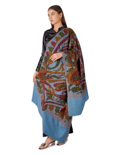 Experience the epitome of elegance and comfort with our Stylish Blue Pashmina Shawl, adorned with an intricate paisley design. This shawl is meticulously crafted from the finest Kashmiri pashmina, offering a luxurious blend of sophistication and timeless beauty. Product Details: Material: Pure Pashmina (100% Cashmere) Size: 100 cm X 203 cm / 40 Inch X 80 Inch / 1.1 x 2.2 Yards (Approx) Base Color: Blue Design: Intricate paisley pattern Origin: Handcrafted in Kashmir by skilled artisans Embroider Winter Pashmina Scarf With Paisley Print, Winter Paisley Print Pashmina Scarves, Winter Paisley Print Pashmina Scarf, Winter Pashmina Shawl With Paisley Print, Winter Paisley Print Pashmina Shawl, Blue Jamawar Dupatta, Pashmina Paisley Print Dupatta Shawl, Paisley Print Pashmina Dupatta Shawl, Traditional Pashmina Dupatta With Paisley Print